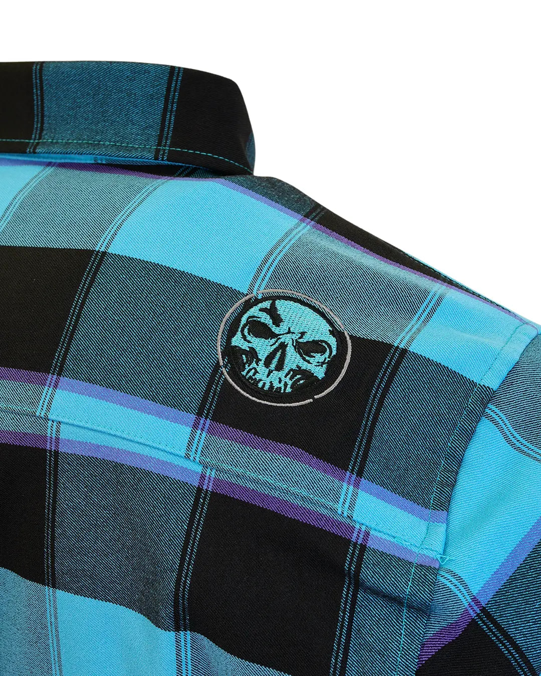 Back shoulder detail of “Survivor 2.0” flannel with teal skull emblem