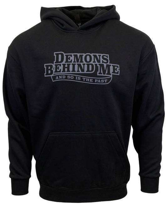 Black hoodie with 'Demons Behind Me' text on a white background