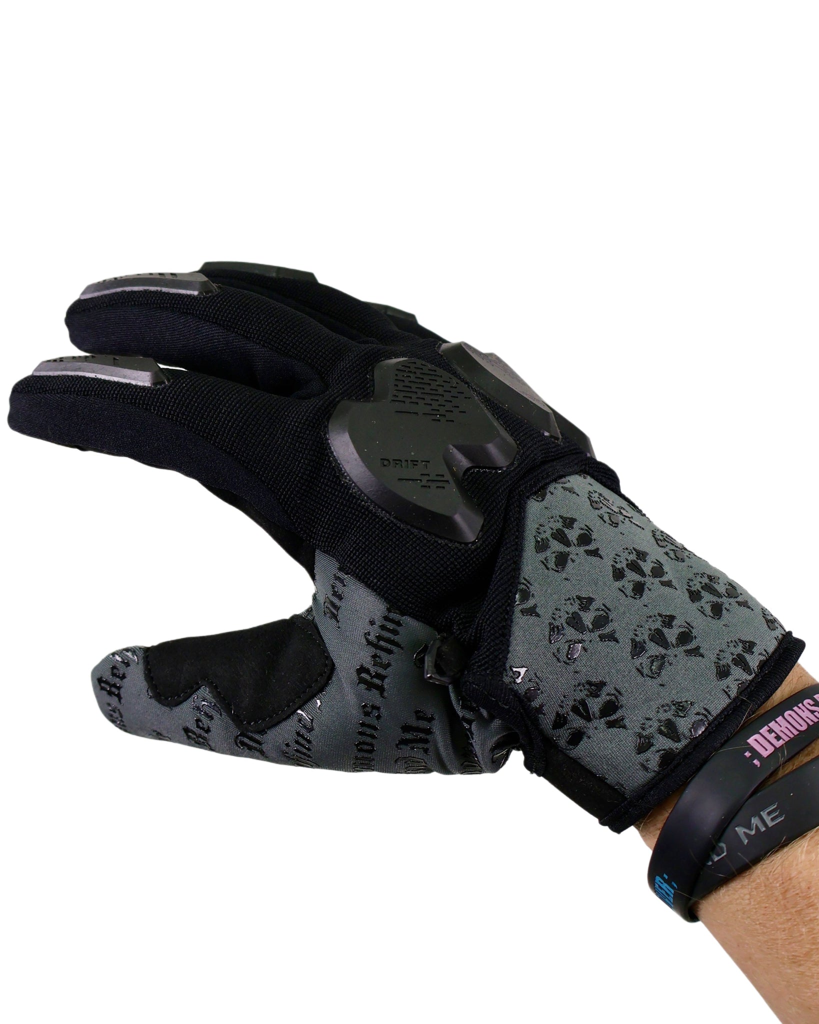 Black and gray glove with paw print pattern on a white background