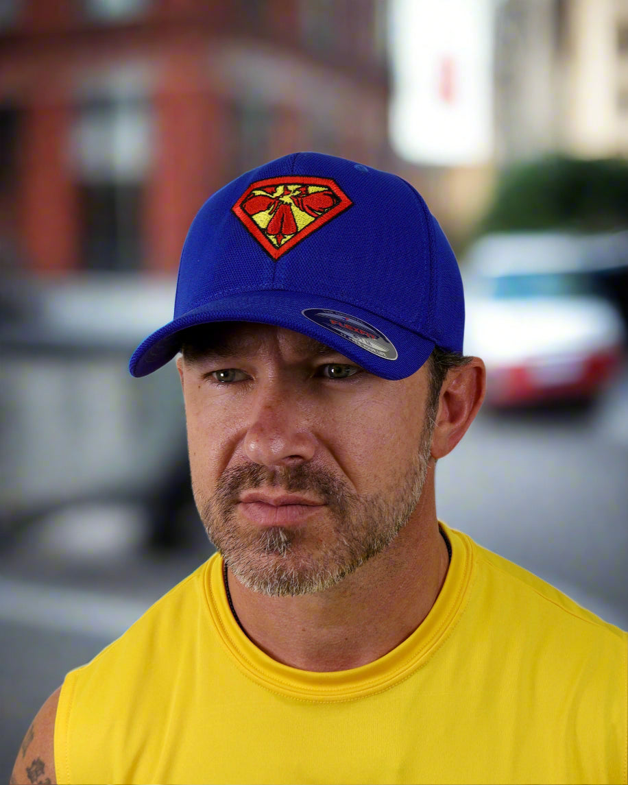 Man wearing a blue cap with a red and yellow logo on a white background