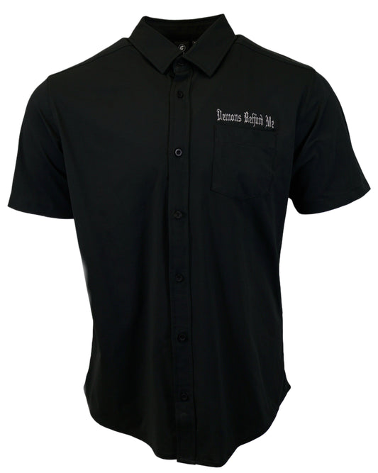 Front view of black micro-perforated stretch embroidered button-up shirt.