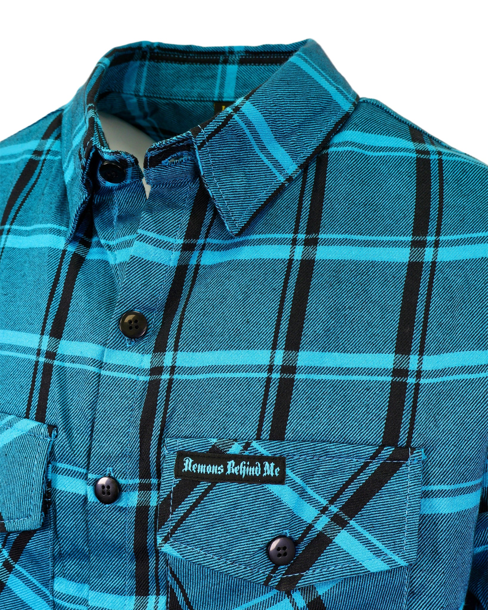 Blue plaid shirt with black buttons and a visible brand logo on a white background