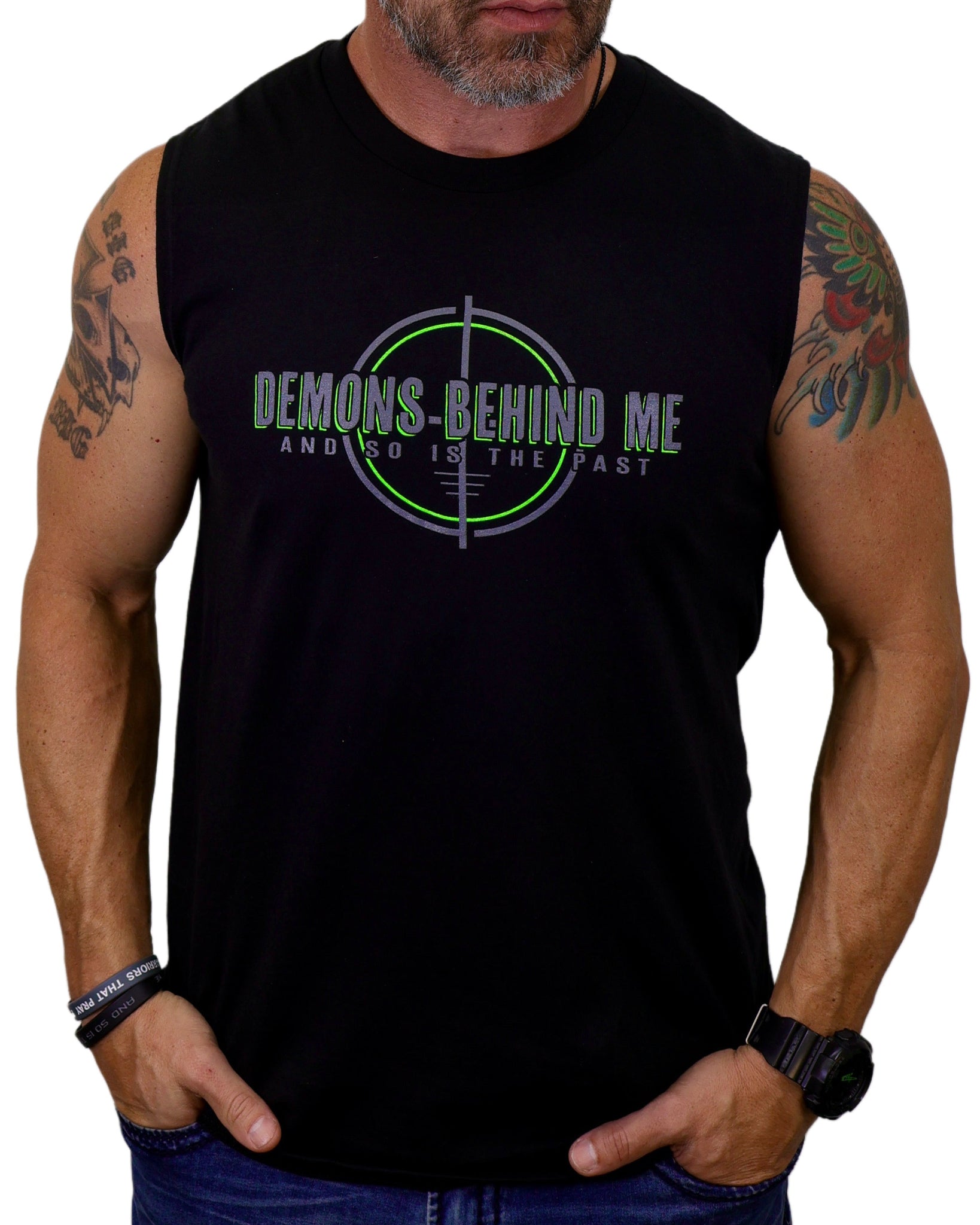 Black sleeveless shirt with 'Demons Behind Me' graphic design on a white background