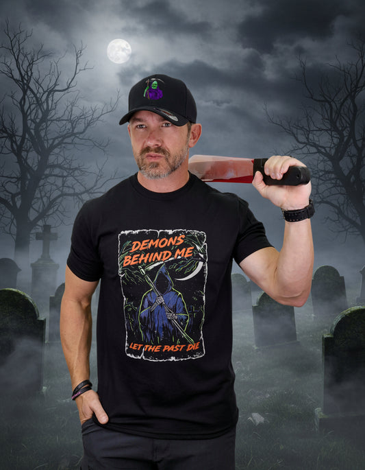 Man wearing a black t-shirt with graphic design and text, holding a baseball bat on a white background