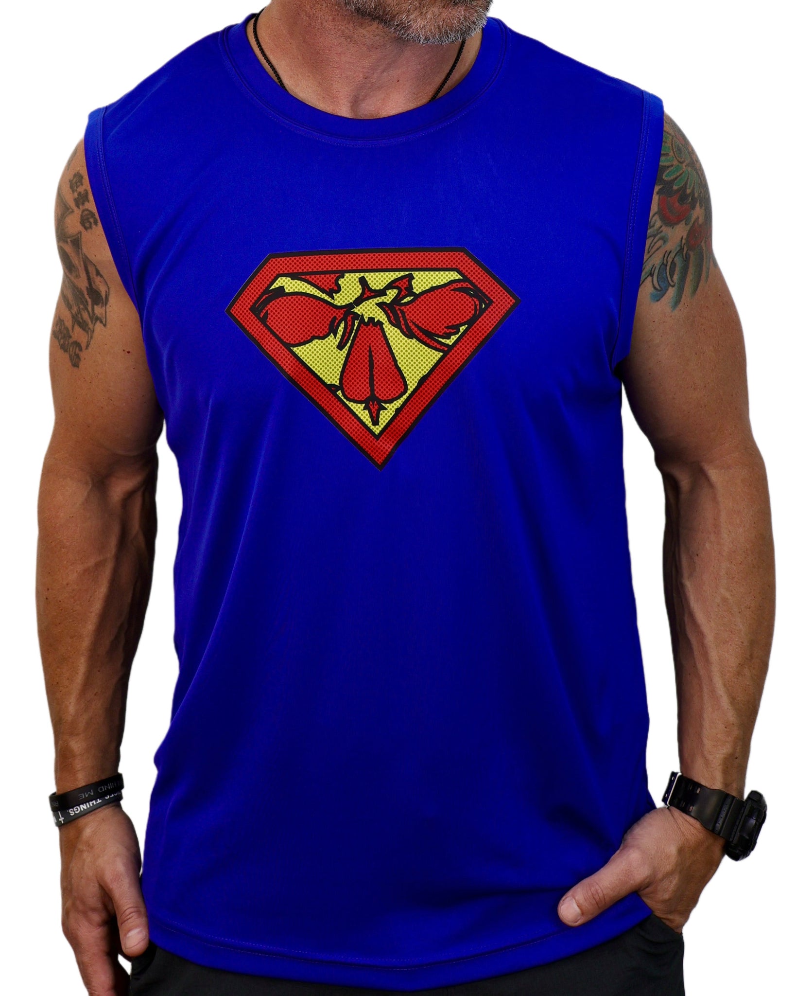 Blue sleeveless shirt with Superman logo worn by a person on a white background