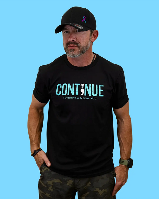Man wearing black “Continue” suicide prevention T-shirt