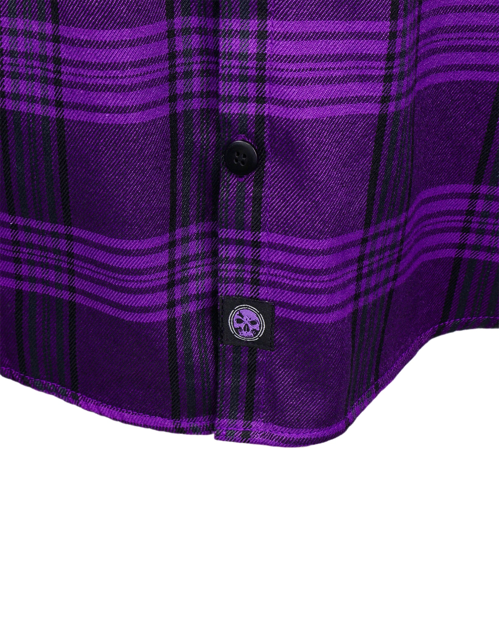 Close-up of a purple plaid shirt with a button and brand logo on a white background