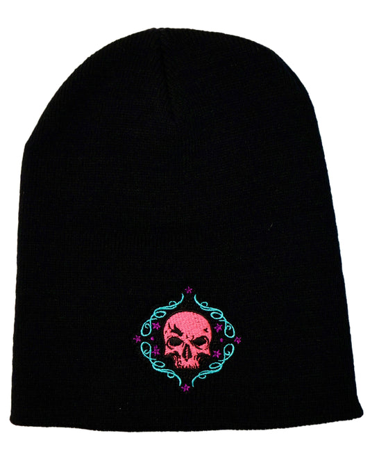 Black beanie with colorful embroidered skull design, shot against a white background.